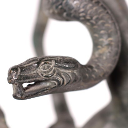 Estatua de Baco con serpiente