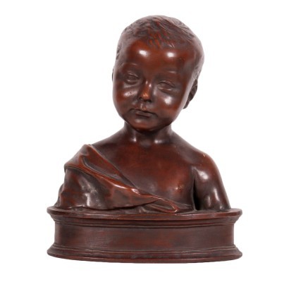 Busto de un niño en la tierra de Signa